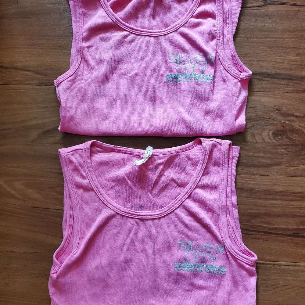 Two available Anvil tank tops